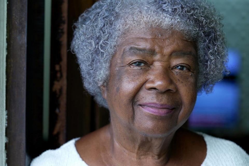 Portrait of a senior black woman face close-up looking at camera